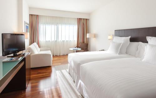 Habitación Triple del hotel Occidental Aranjuez. Foto 1