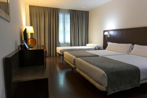 Habitación Doble con cama supletoria del hotel Iberik Santo Domingo Plaza