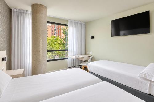 Habitación Triple del hotel Rice Bulevar. Foto 1