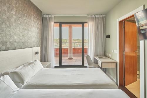 Habitación Doble con terraza - 2 camas del hotel Rice Bulevar. Foto 5
