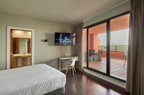 Habitación Doble con terraza del hotel Rice Bulevar. Foto 3