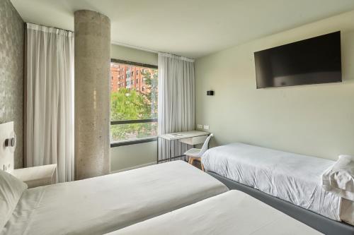 Habitación Triple del hotel Rice Bulevar. Foto 3