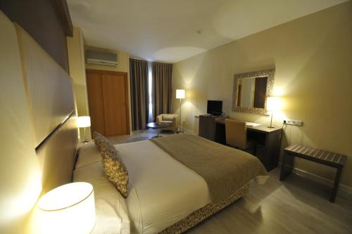 Habitación Doble - 1 o 2 camas del hotel Puerta De Segovia. Foto 1