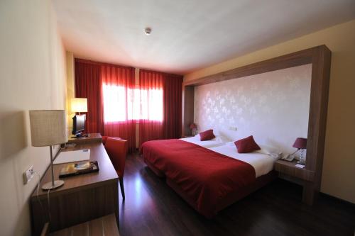 Habitación Doble - 1 o 2 camas del hotel Puerta De Segovia. Foto 3