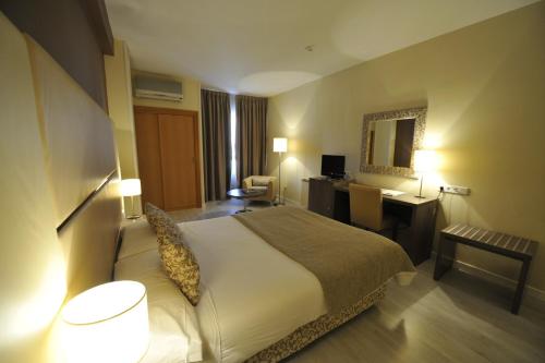 Habitación Doble - 1 o 2 camas del hotel Puerta De Segovia. Foto 5