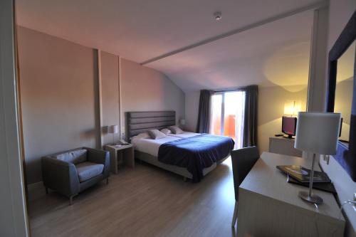 Habitación Doble - 1 o 2 camas del hotel Puerta De Segovia. Foto 8