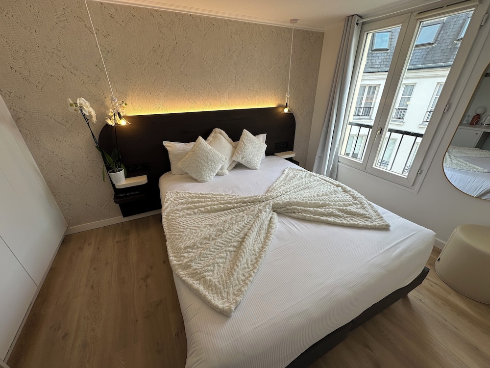 Habitación Doble Superior del hotel Opera Deauville. Foto 7