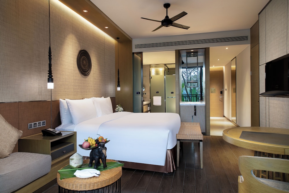 HABITACIÓN DELUXE, 1 Cama King Size, Balcón Privado y Vistas al Parque del hotel Pullman Resort Xishuangbanna. Foto 1