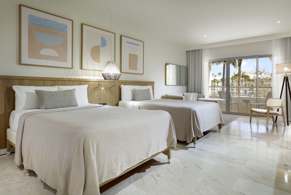 Junior Suite con vistas al jardín del hotel Paradisus Palma Real Golf and Spa Resort. Foto 3