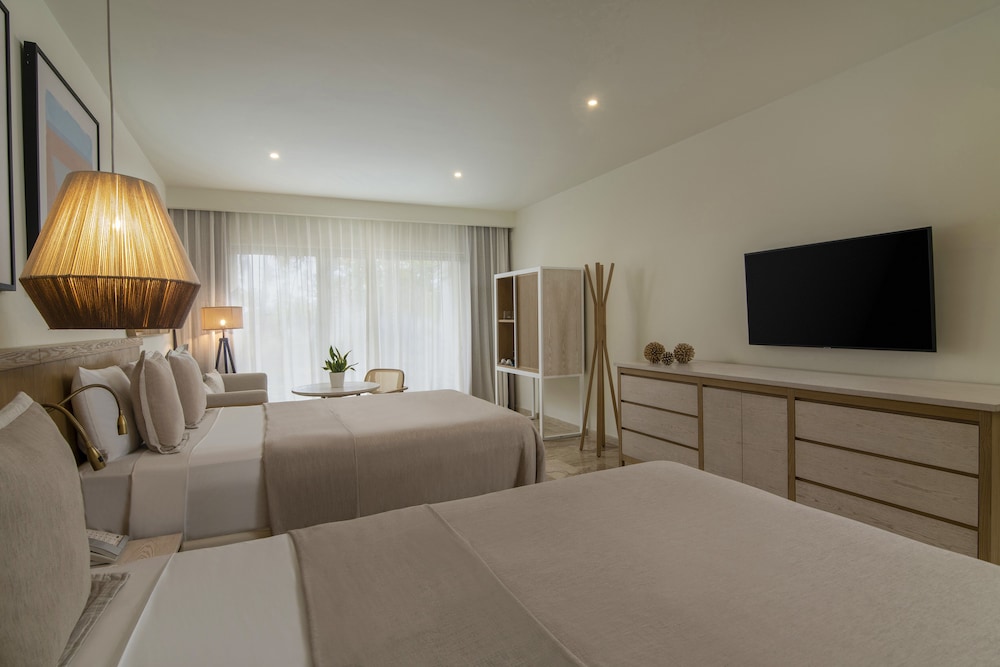 Master Suite de Dos Dormitorios con Vistas al Jardín del hotel Paradisus Palma Real Golf and Spa Resort. Foto 1