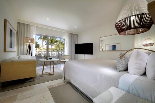 Junior suite Vista Jardín 1 Cama king 2 Camas individuales del hotel Paradisus Palma Real Golf and Spa Resort