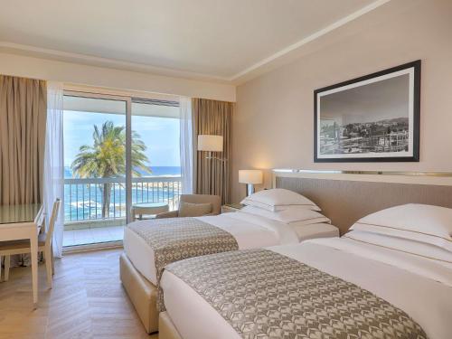 Executive Twin Room with Sea View del hotel Mövenpick Beirut. Foto 1