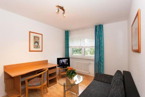 Habitación Cuádruple Estándar del hotel Friends Saarbrücken. Foto 4