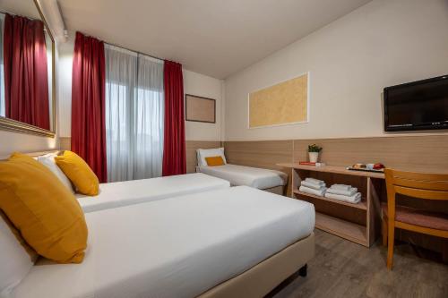Habitación Triple del hotel Ih Hotels Milano St. John Sesto San Giovanni