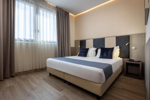Habitación Doble Deluxe del hotel Ih Hotels Milano St. John Sesto San Giovanni