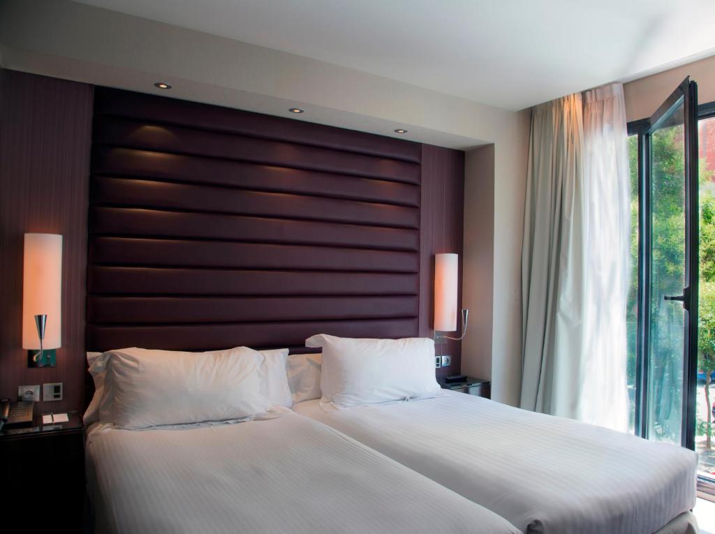 Habitación doble 2 camas del hotel Pestana Arena Barcelona. Foto 1