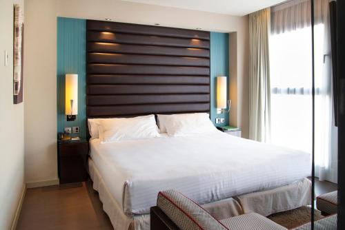 Habitación Deluxe - 1 cama extragrande del hotel Pestana Arena Barcelona