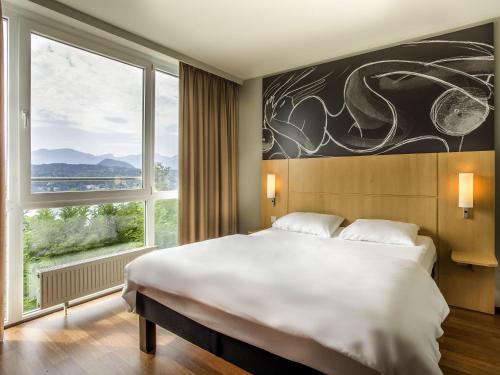 Habitación estándar con 1 cama king size del hotel Ibis Wörthersee