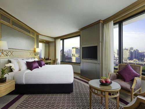 Corner Room with 1 King Bed - 15% discount on Food and Soft Beverage del hotel Grand Mercure Bangkok Atrium. Foto 1