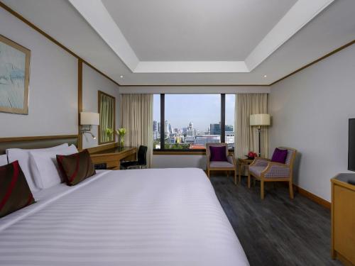 Superior Room with 1 King Bed - 15% discount on Food and Soft Beverage del hotel Grand Mercure Bangkok Atrium. Foto 1