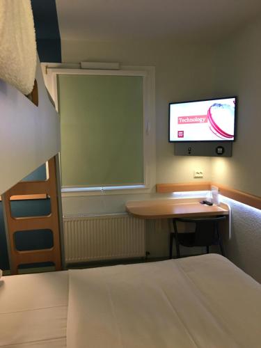 Habitación Doble Estándar del hotel Ibis Budget Muenchen Putzbrunn. Foto 4