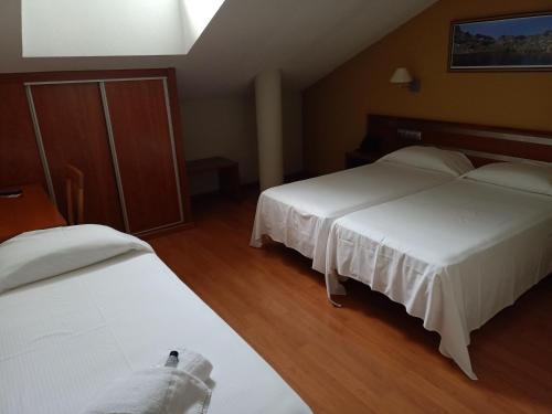 Habitación Triple del hotel Ele Mirador de Santa Ana. Foto 7