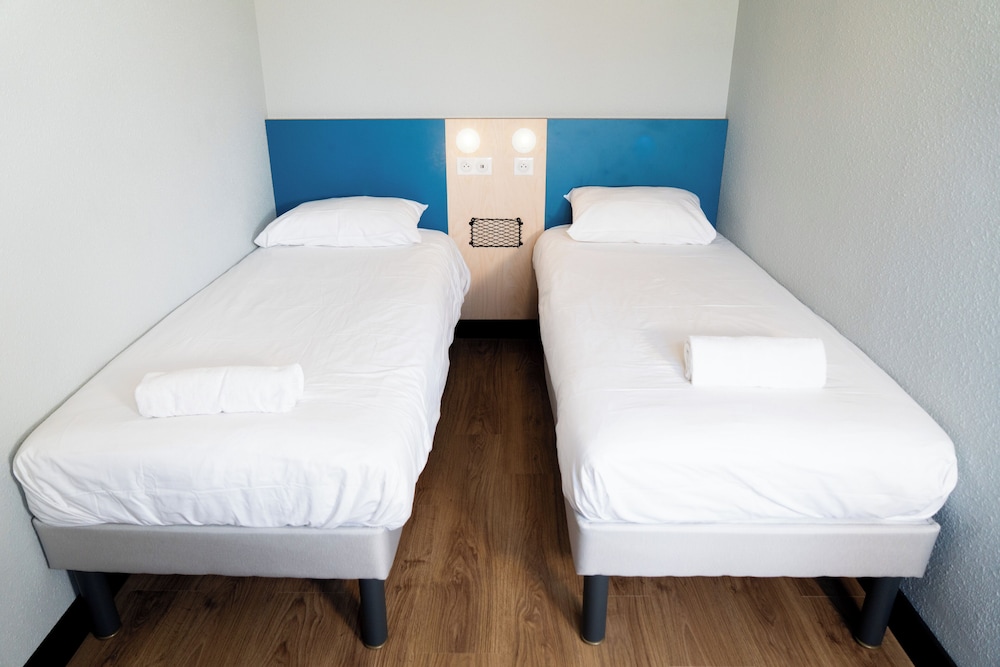 Habitación, 2 camas individuales del hotel Ibis Budget Aix En Provence. Foto 1