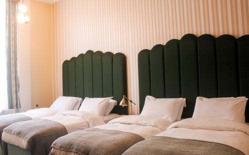 Habitación cuádruple del hotel The Columbia. Foto 1