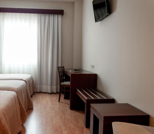 Habitación Triple del hotel Santiago De León