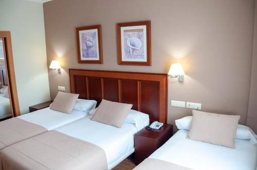 Habitación Doble con cama supletoria - 2 camas del hotel Santiago De León