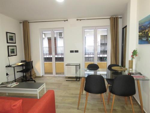 Apartamento Con Cocina 1 habitación Sofá Cama incluido 2 Camas individuales Normal del hotel Living Sevilla Apartments Hércules. Foto 7