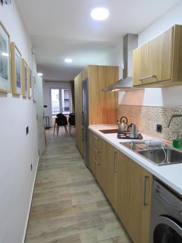 Apartamento Con Cocina 1 habitación Sofá Cama incluido 2 Camas individuales Normal del hotel Living Sevilla Apartments Hércules. Foto 13