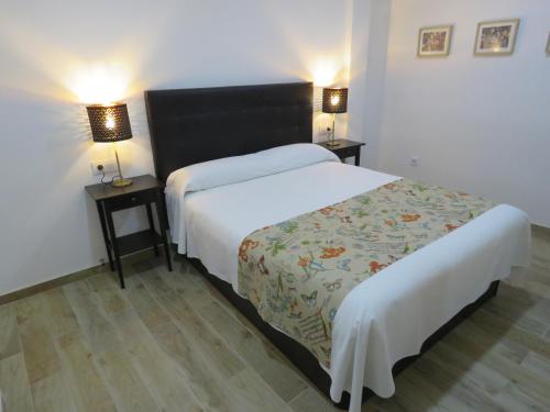 Apartamento Con Cocina 1 habitación Sofá Cama incluido 2 Camas individuales Normal del hotel Living Sevilla Apartments Hércules. Foto 17