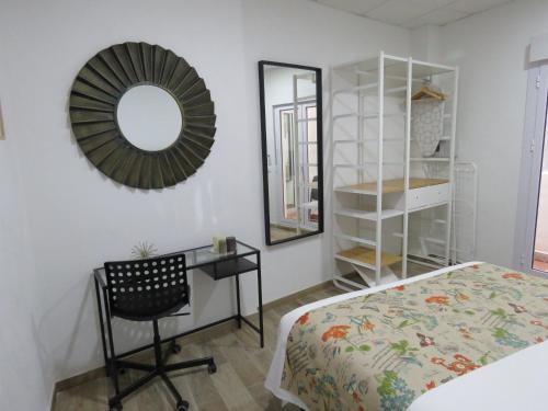 Apartamento Con Cocina 1 habitación Sofá Cama incluido 2 Camas individuales Normal del hotel Living Sevilla Apartments Hércules. Foto 18