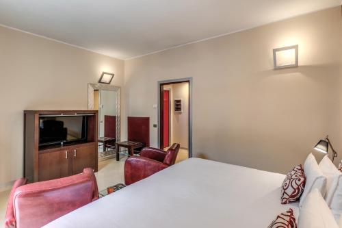 Habitación Deluxe del hotel La Griffe. Foto 10