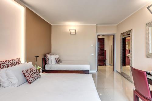 Habitación Triple del hotel La Griffe. Foto 12