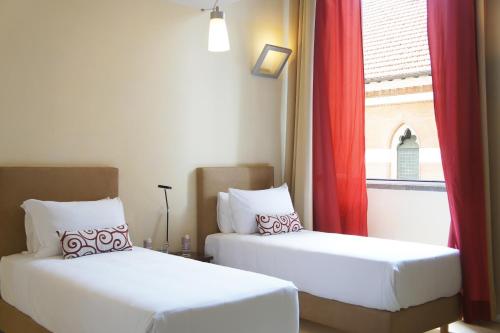 Habitación Cuádruple Dúplex del hotel La Griffe. Foto 1