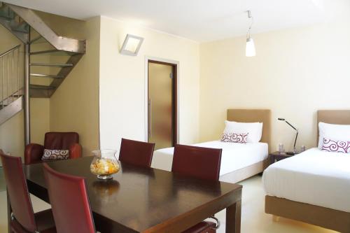 Habitación Cuádruple Dúplex del hotel La Griffe. Foto 2