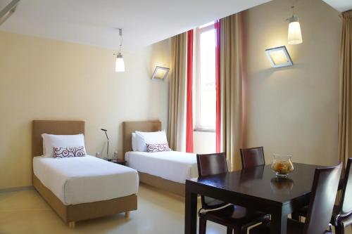 Habitación Cuádruple Dúplex del hotel La Griffe. Foto 4