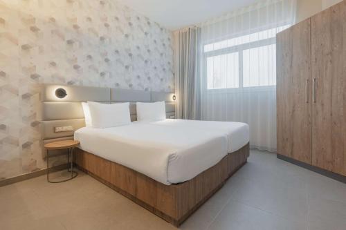 Habitación Familiar de 2 dormitorios con vistas al mar del hotel DoubleTree by Hilton Malta. Foto 4