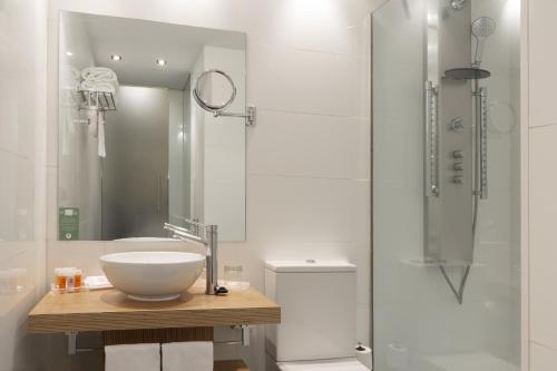 Habitación Cuádruple del hotel Petit Palace Plaza del Carmen. Foto 4