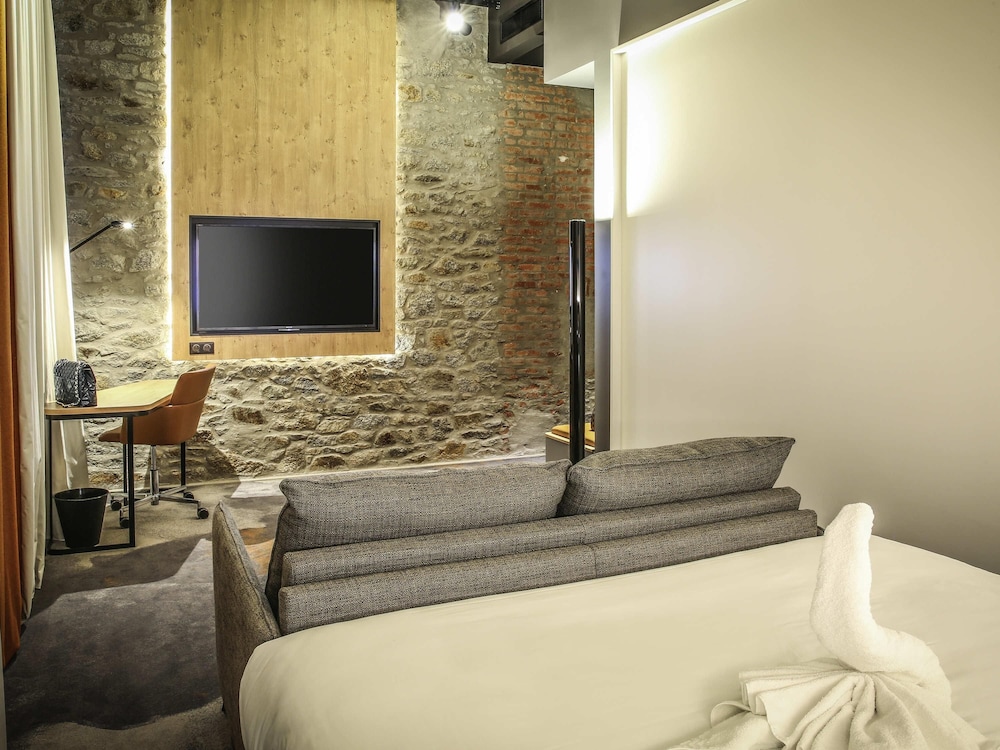 Habitación Executive con cama de matrimonio y sofá cama doble del hotel Novotel Saint Brieuc Centre Gare. Foto 3