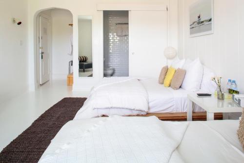 Habitación doble con 2 camas dobles y vistas al jardín del hotel Sole East Resort. Foto 3