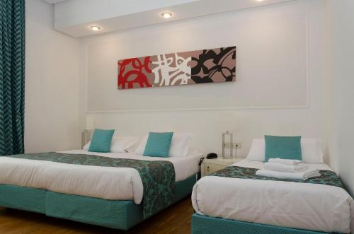 Habitación Triple del hotel Traiano. Foto 1