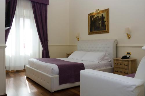 Habitación Triple del hotel Traiano. Foto 2