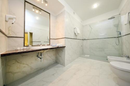 Habitación Triple del hotel Traiano. Foto 3