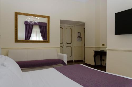 Habitación Triple del hotel Traiano. Foto 4