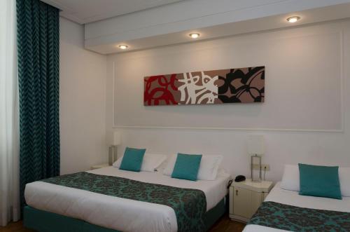 Habitación Triple del hotel Traiano. Foto 5