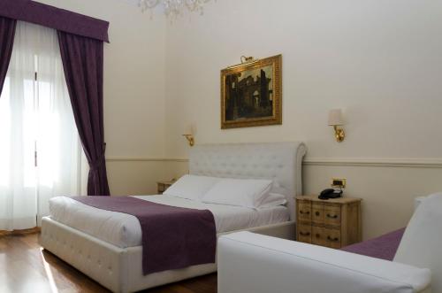 Habitación Triple del hotel Traiano. Foto 6
