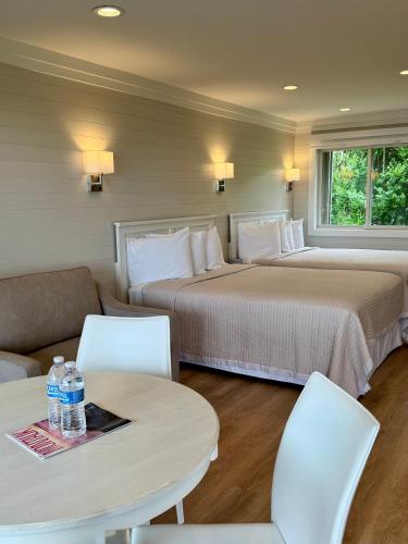 Estudio Deluxe con cama grande del hotel Hartman's Briney Breezes Beach Resort. Foto 5